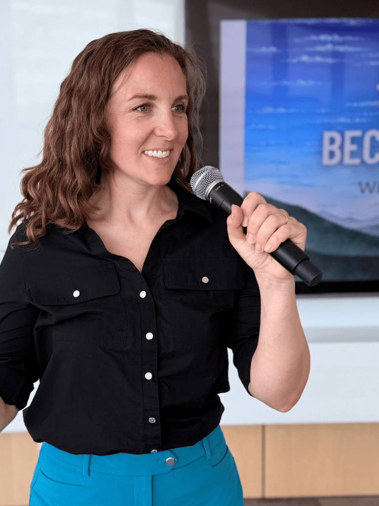 Emily speaking at an event.
